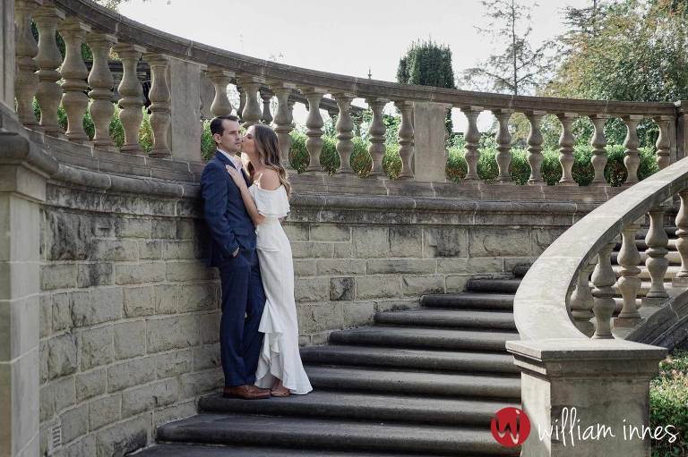 standing on the stairs at Greystone Mansion